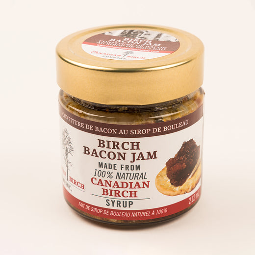 Jar of jam featuring the text “Birch Bacon Jam”