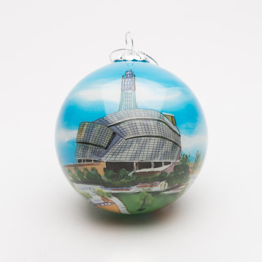 Spherical glass ornament featuring a hand-painted image of the Museum