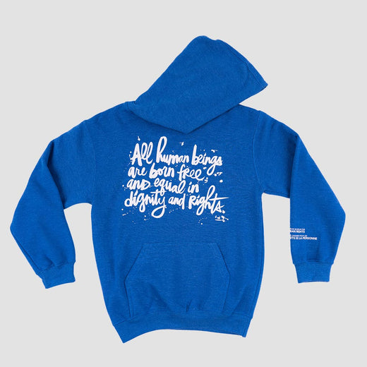 A blue hoodie laid flat with white stylized script.
