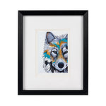 Framed stylized print of a wolf.