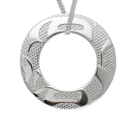 silver-pewter ring-shaped pendant on a silver chain