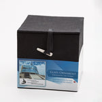 A black gift box with a tag that features an image of the Museum and the text “Glass Ornament” and “Ornement de verre”