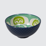 Navy blue textured bowl featuring an inner contemporary Indigenous pattern of the moon.