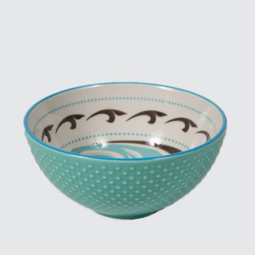 Light green textured bowl featuring an inner contemporary Indigenous pattern of a killer whale.