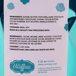 Close-up of a white label on a metallic teal blue plastic bag. It lists the ingredients and information about the Utoffeea company. The Utoffea logo is in the bottom-left corner.